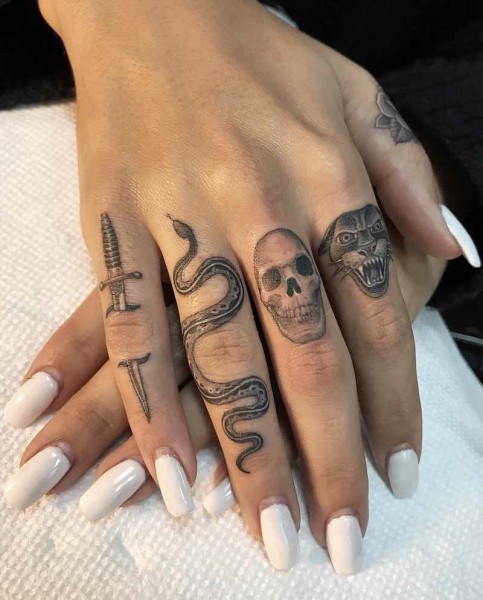 14979 X dagger snake skull panther small finger tattoos by ben grillo