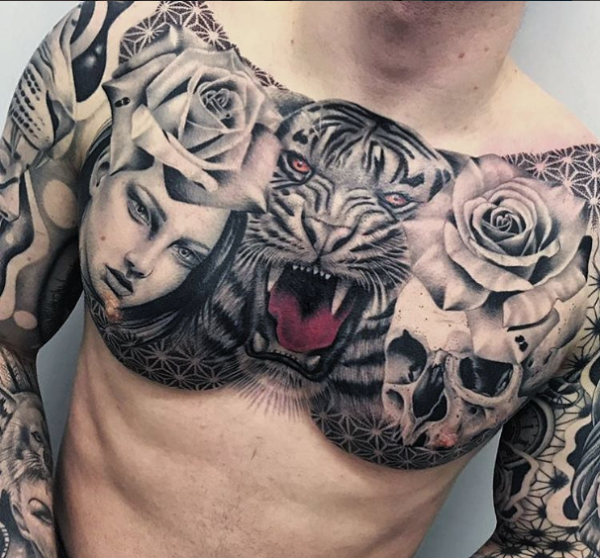 Premium Photo | A man with tattoos on his chest and a tattoo of a man with  tattoos on his chest.