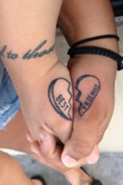 Matching friendship tattoos.