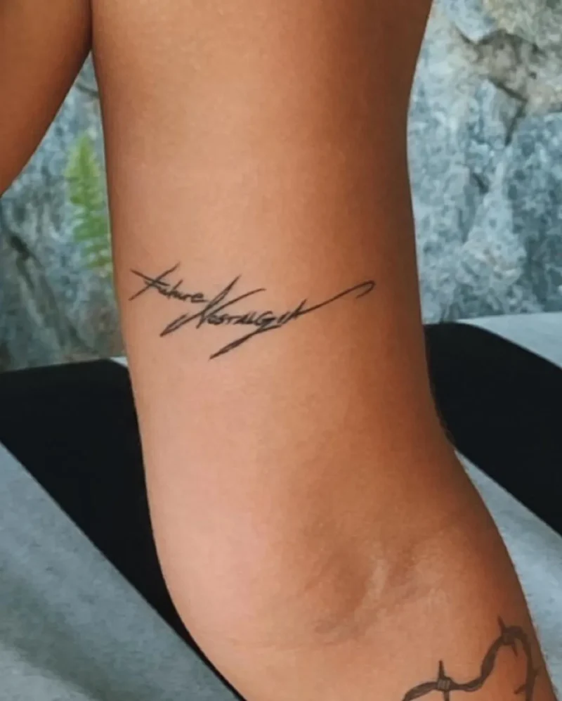 Dua Lipa arm tattoos